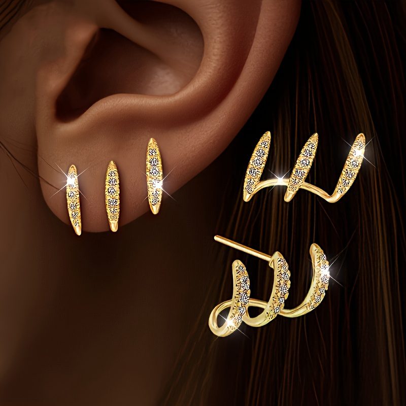Une paire d'oreilles sophistiquées à trois niveaux en cristal, conçues pour les femmes. Elles offrent un regard éblouissant et charmant avec des crochets en acier inoxydable, ce qui les rend parfaites pour un usage quotidien et les événements spéciaux. Un excellent choix de cadeau.