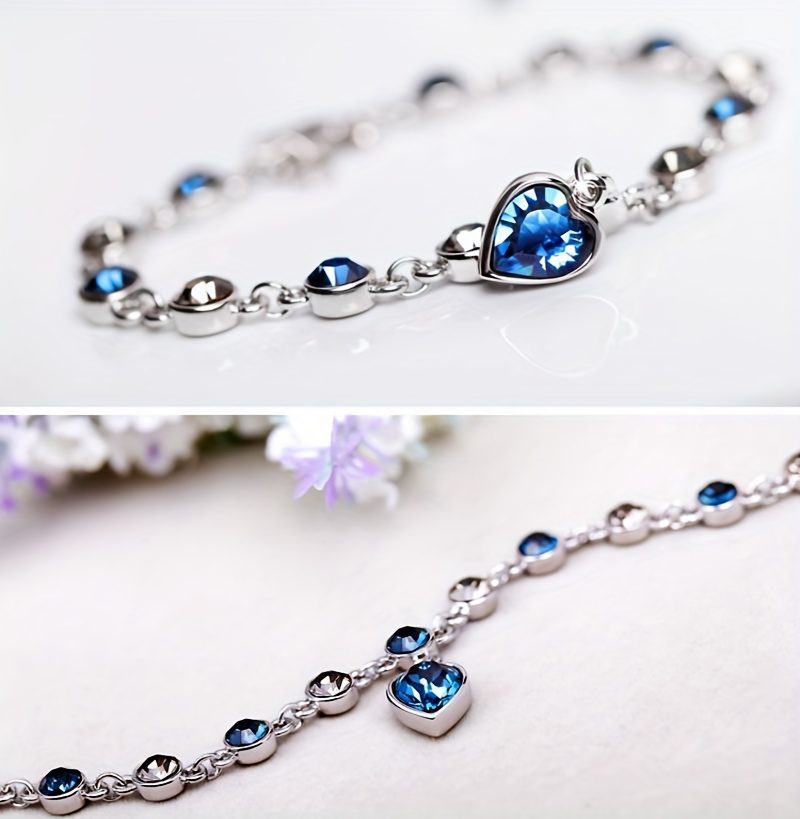 Bracelet exquis et élégant en argent S925, orné d'un cristal en forme de cœur dans une magnifique bleu lac, parfait comme cadeau